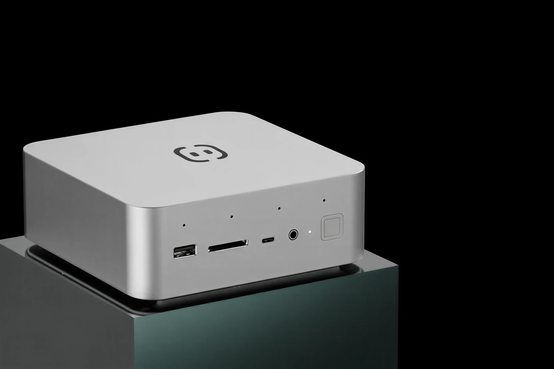 Own 1 from the front right: a machined silver body with the OwnX mark on top